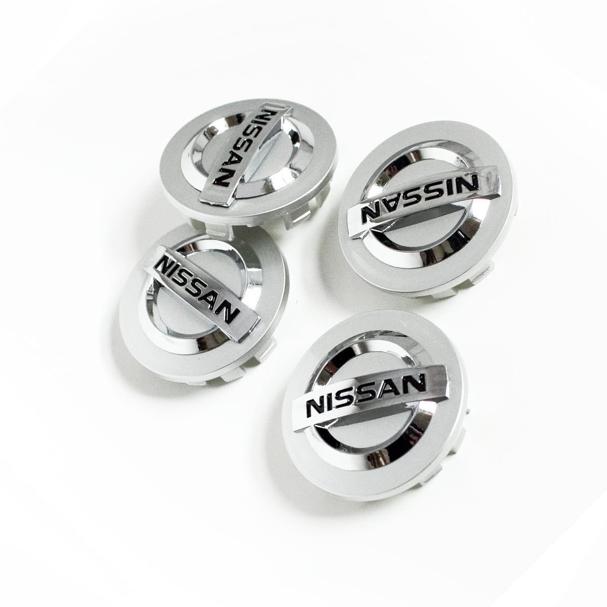 4x 54mm Silver Nissan Wheel Center Caps | 6 Side Auto